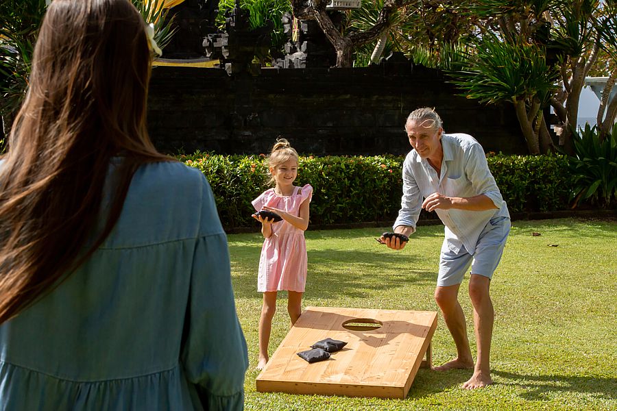 Make outdoor entertaining fun with games like corn hole and bocce.